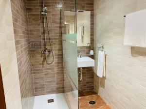 Kúpeľňa v ubytovaní Apartamentos La Casa del Azafrán