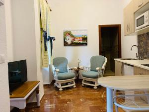 Kuchyňa alebo kuchynka v ubytovaní Apartamentos La Casa del Azafrán