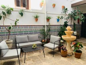 Posedenie v ubytovaní Apartamentos La Casa del Azafrán