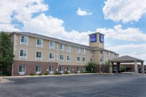 a building with a clock tower on top of it at Sleep Inn & Suites Washington near Peoria in Washington