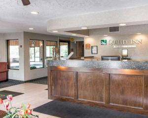 a lobby of a quality inn with a reception desk at Quality Inn Hudsonville in Hudsonville