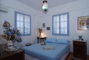 Llit o llits en una habitació de Windmill Studios