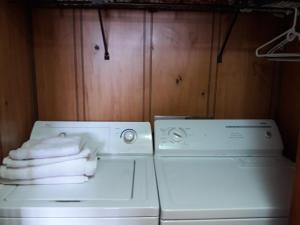 two white washing machines sitting next to each other at 301 D Summit Dr. , Snowshoe Mountains, WV 26209 in Snowshoe