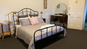 Ένα ή περισσότερα κρεβάτια σε δωμάτιο στο The Grand Hotel Millicent