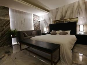 Postel nebo postele na pokoji v ubytování Michelle hotel