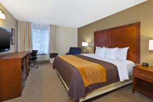 Voodi või voodid majutusasutuse Comfort Inn & Suites toas