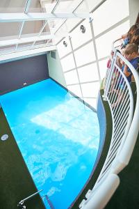 a swimming pool on the top floor of a cruise ship at Salamanca Inn in Hobart