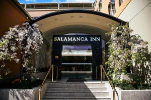 a large building with a sign on the side of it at Salamanca Inn in Hobart