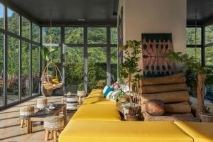 Posezení v ubytování The Peri Hotel Khao Yai