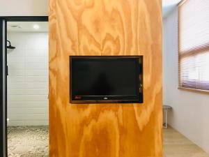 TV a/nebo společenská místnost v ubytování Home Rest Hotel 2
