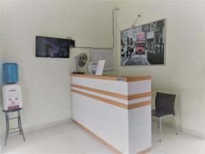 TV a/nebo společenská místnost v ubytování Hotel The Village Syariah