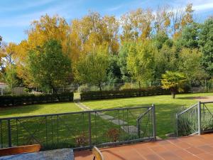 a view of a park from a balcony at 36 On Boom B&B in Zastron