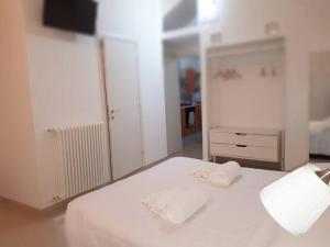 Posteľ alebo postele v izbe v ubytovaní La Rosa dei Sassi 2