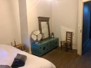 Postel nebo postele na pokoji v ubytování Maisons de Vignerons