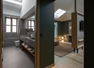 Łóżko lub łóżka w pokoju w obiekcie Hotel Arbaso