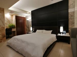 Postel nebo postele na pokoji v ubytování Michelle hotel