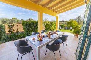 A balcony or terrace at Finca SON SERRA Buger by Mallorca Villa Selection