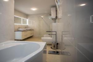 Ванная комната в Luxury Blue Villas Vis