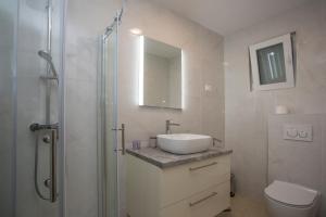 Ванная комната в Luxury Blue Villas Vis
