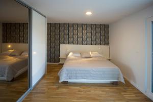 Кровать или кровати в номере Luxury Blue Villas Vis