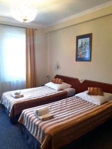 מיטה או מיטות בחדר ב-Hotel Salis