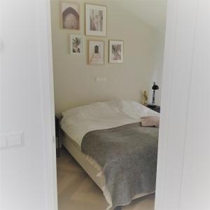 Кровать или кровати в номере In de bocht