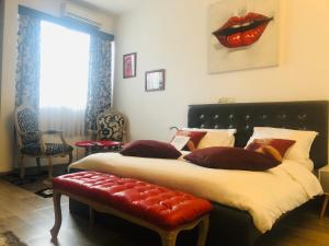 Postel nebo postele na pokoji v ubytování Hotel Le Griffon