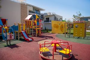 a playground with many different types of play equipment at AURUM FAMILY RESORT & SPA in Blagoveshchenskaya