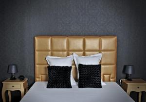 Postel nebo postele na pokoji v ubytování V E R O N E - Rooms & Suites - Liège - Rocourt