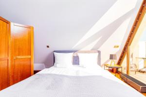 Posteľ alebo postele v izbe v ubytovaní Boogie Apartments