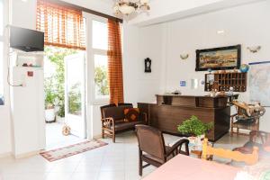 TV a/nebo společenská místnost v ubytování Hotel Karpathos