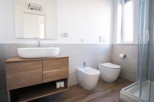 Koupelna v ubytování Rossani Suites&Aparts