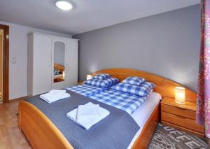 Posteľ alebo postele v izbe v ubytovaní ApartamentVanessa