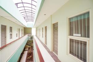 Kép Ardhya Guesthouse Syariah by ecommerceloka szállásáról Sidoarjóban a galériában