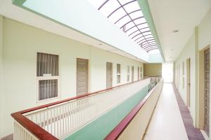 Kép Ardhya Guesthouse Syariah by ecommerceloka szállásáról Sidoarjóban a galériában