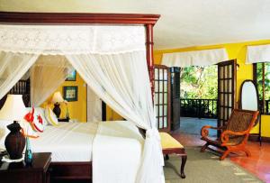 Krevet ili kreveti u jedinici u okviru objekta Spring Hotel Bequia
