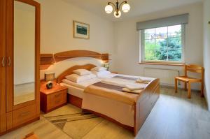 Posteľ alebo postele v izbe v ubytovaní ApartamentVanessa