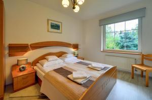 Posteľ alebo postele v izbe v ubytovaní ApartamentVanessa