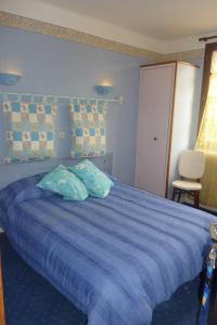 Postel nebo postele na pokoji v ubytování Hotel Font De Lauro