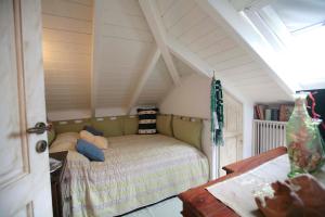 Llit o llits en una habitació de cozy attic