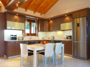 Kuchyň nebo kuchyňský kout v ubytování Villa Vassilis Fiscardo Kefalonia