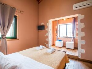 Postel nebo postele na pokoji v ubytování Villa Amvrosia Nr Kalives Crete + 37 fotografií