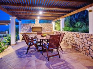 Patio alebo iná vonkajšia časť ubytovania Villa Odysseus Spartia Kefalonia