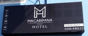 a sign for a marriott hotel on a television screen at Macaripana in Gualeguaychú