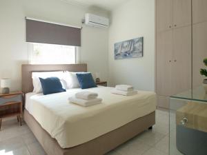 Posteľ alebo postele v izbe v ubytovaní Villa Nikos Megala Chorafia Crete