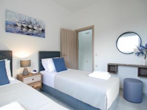 Posteľ alebo postele v izbe v ubytovaní Villa Nikos Megala Chorafia Crete