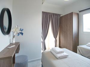 Posteľ alebo postele v izbe v ubytovaní Villa Nikos Megala Chorafia Crete