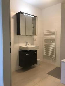 Ванная комната в SUNNY VIENNA by JR City Apartments