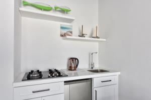 A cozinha ou cozinha compacta de Brand-new Esmeralda Apartment