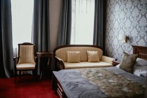 Postel nebo postele na pokoji v ubytování Boutique Hotel Annuska + 37 fotografií